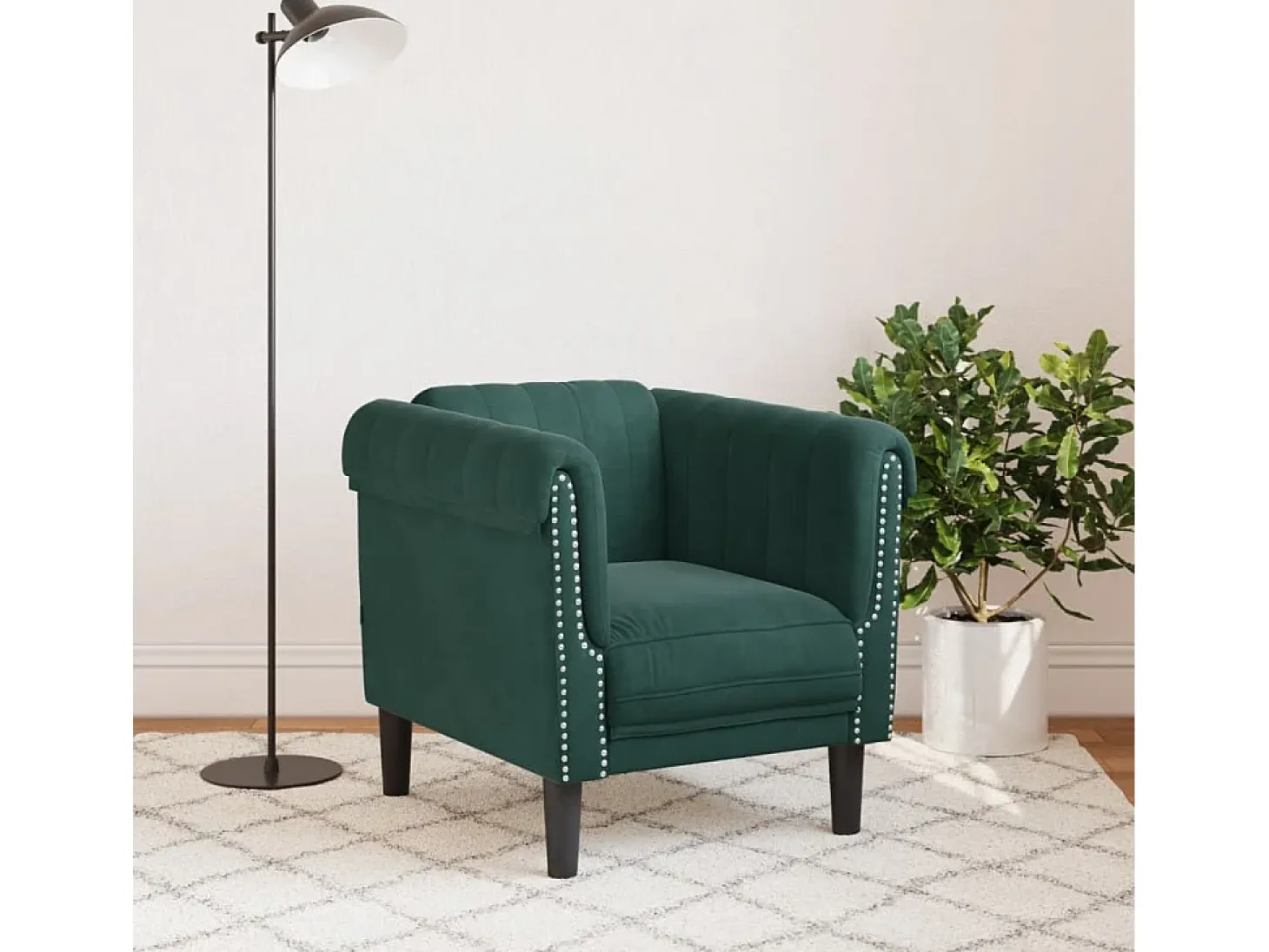 Sillón de terciopelo verde oscuro