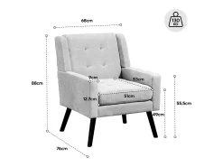 Sillón en tejido de lino gris claro con patas de madera.