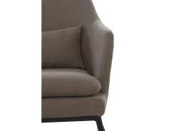 Sillón tapizado color topo con cojín y patas de metal negras